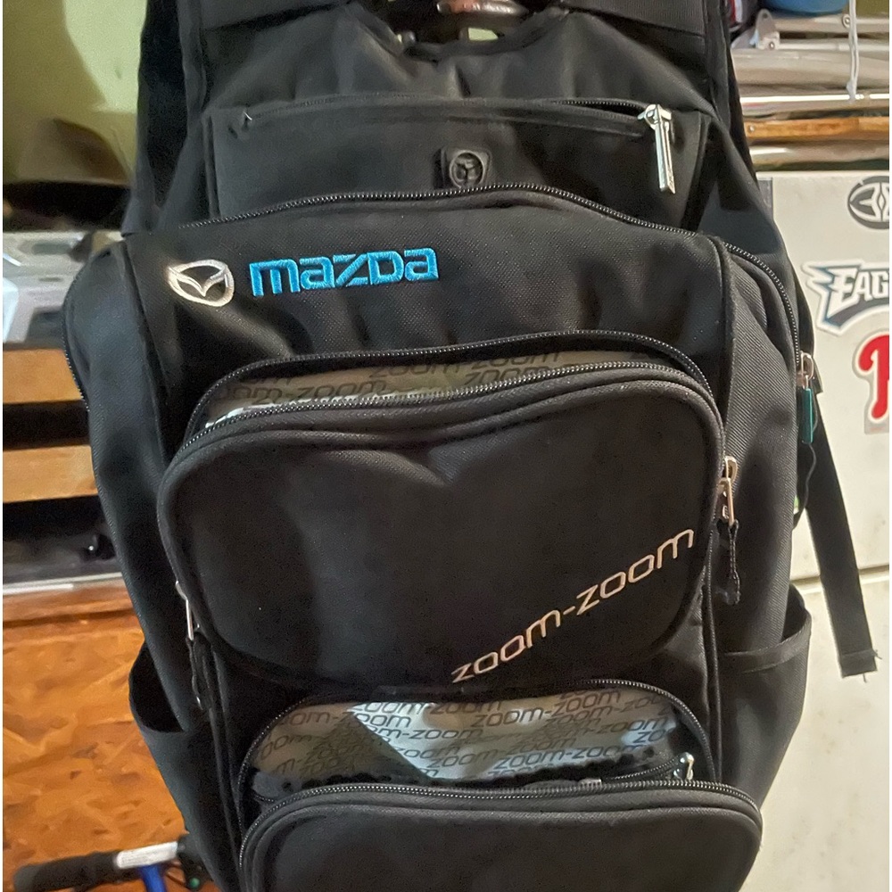 Multi pouch/pocket backpack
